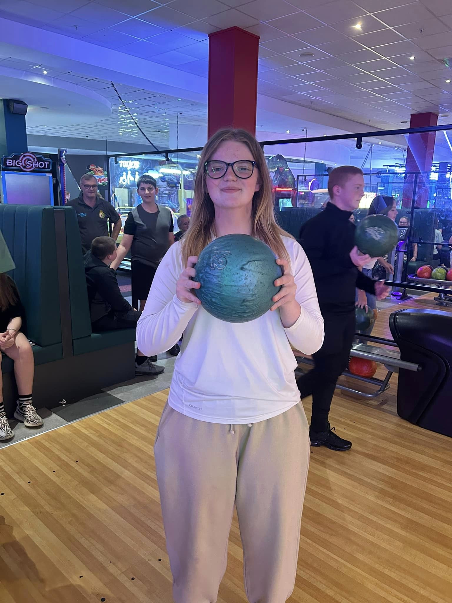 AC Gordon poses with a bowling ball